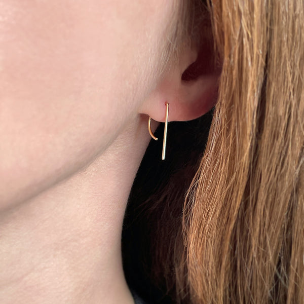 Earrings that go through two holes on sale